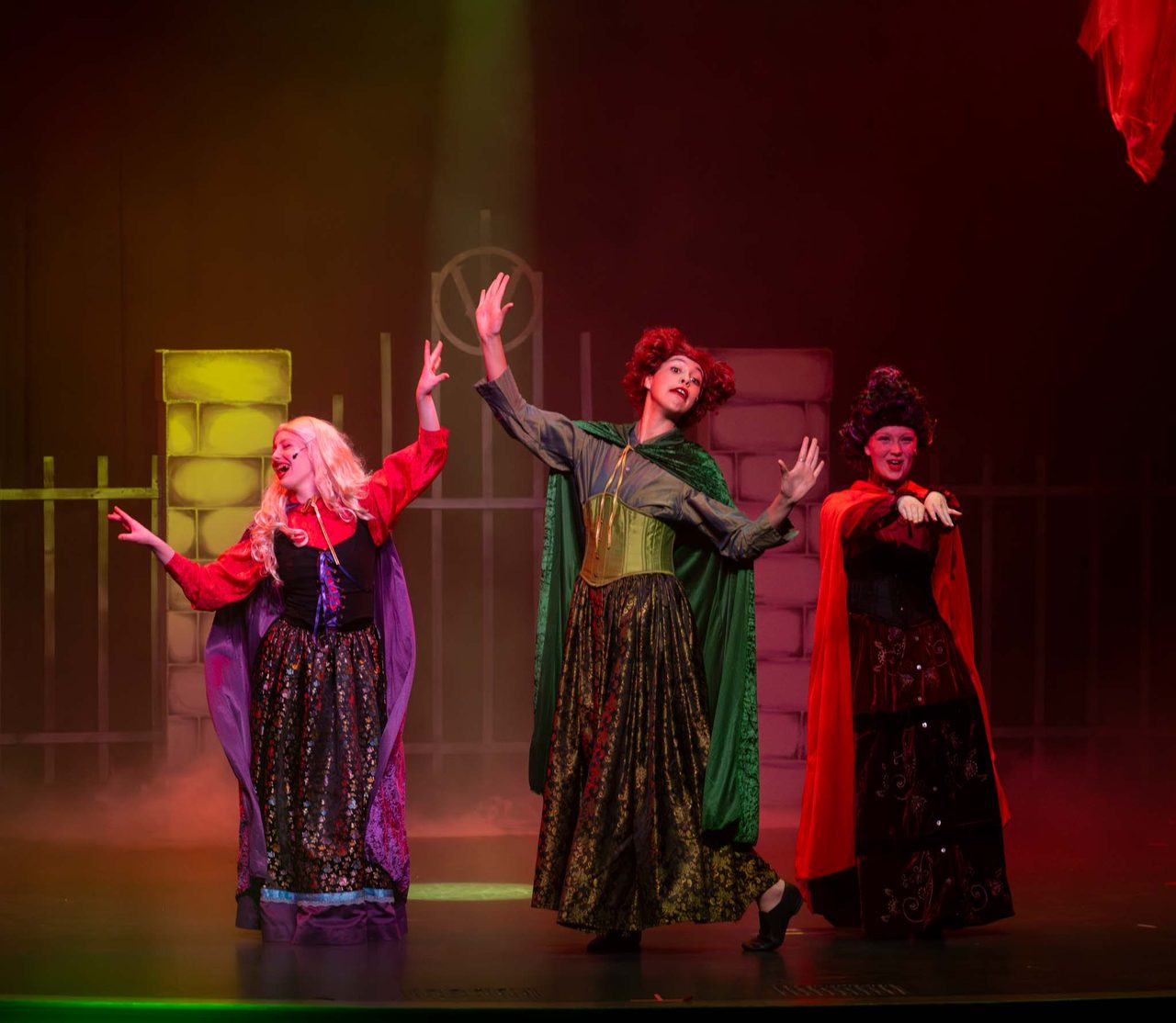 Aspire Performing Co. performers in costume at Villains Night