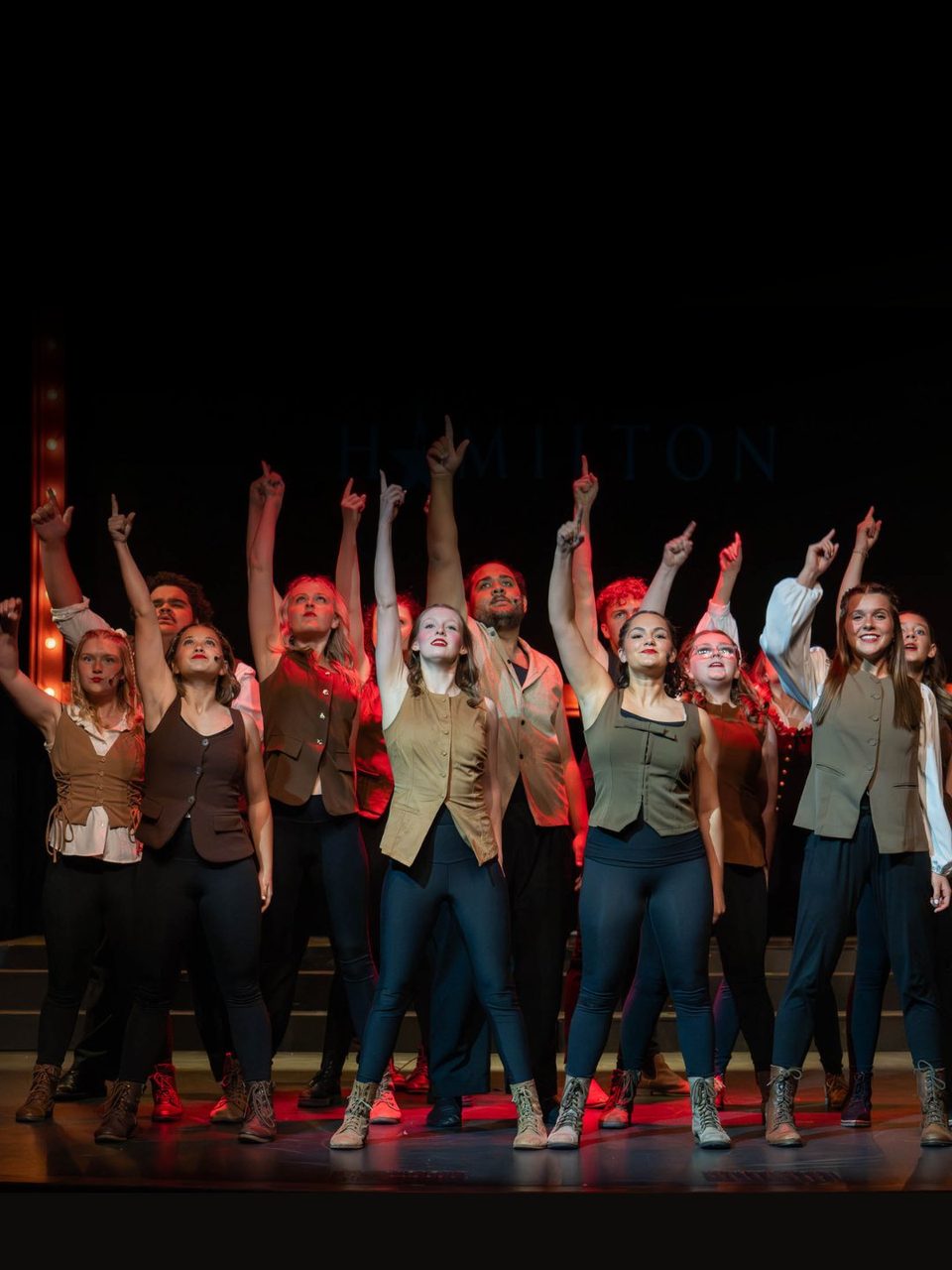 Aspire Performing Co. ensemble performing a number from Hamilton