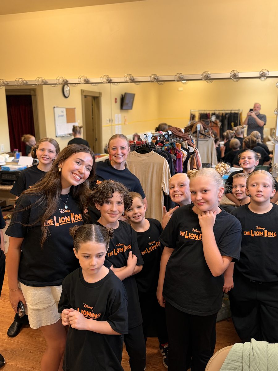 The camp company gathered backstage before the performance