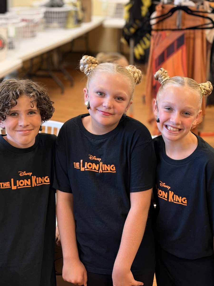 Three Young Artists backstage before the show