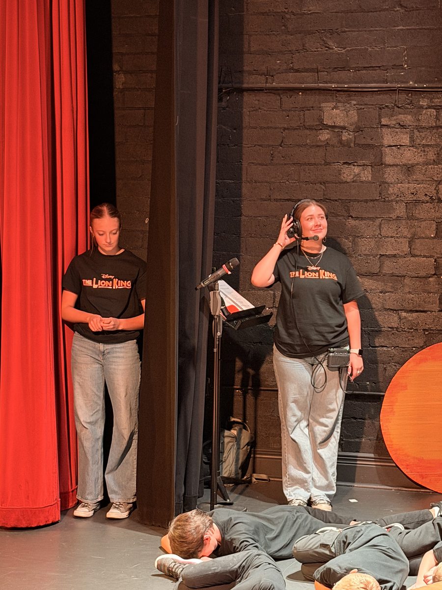 Teen stage managers running the show from the wings