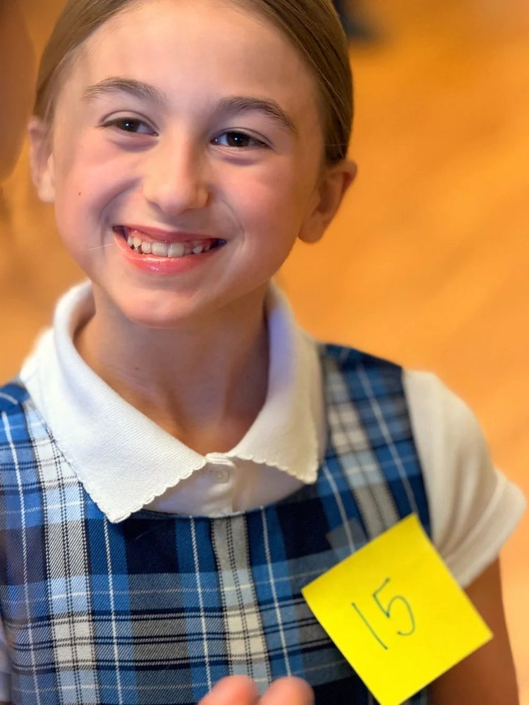 A smiling Young Artist at the Matilda Jr. camp