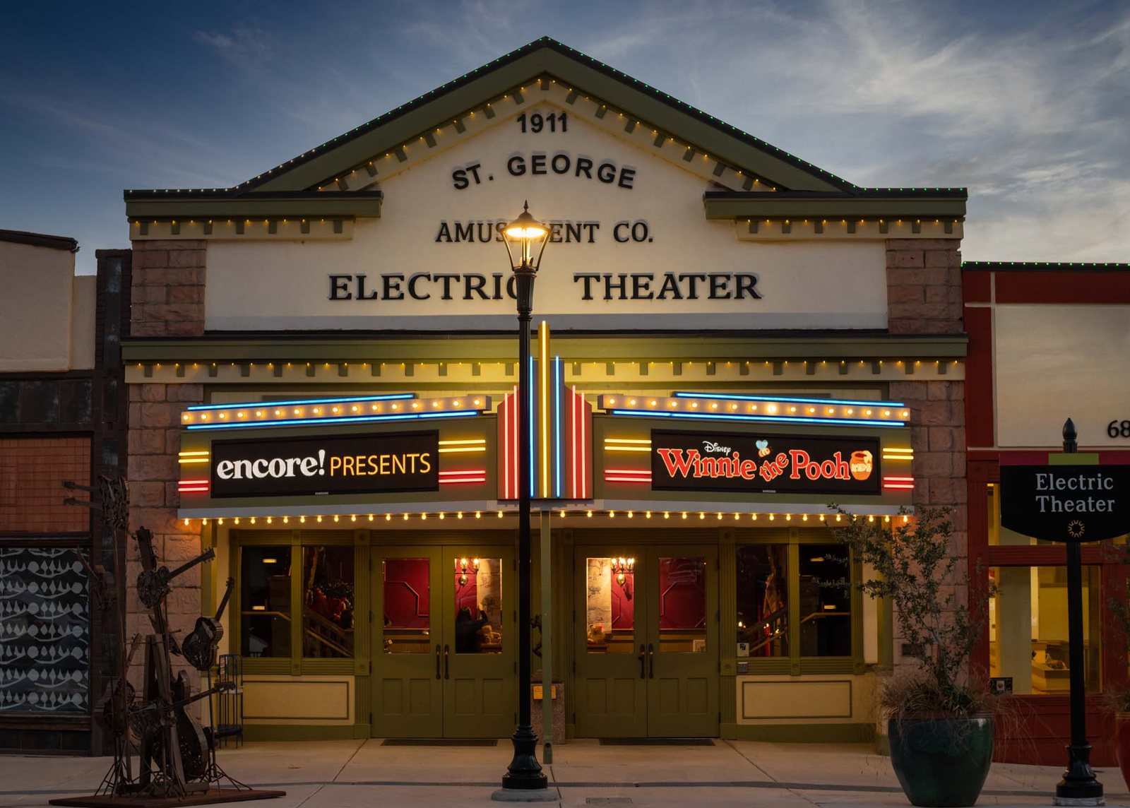 The restored Electric Theater facade at dusk, marquee reading Encore presents