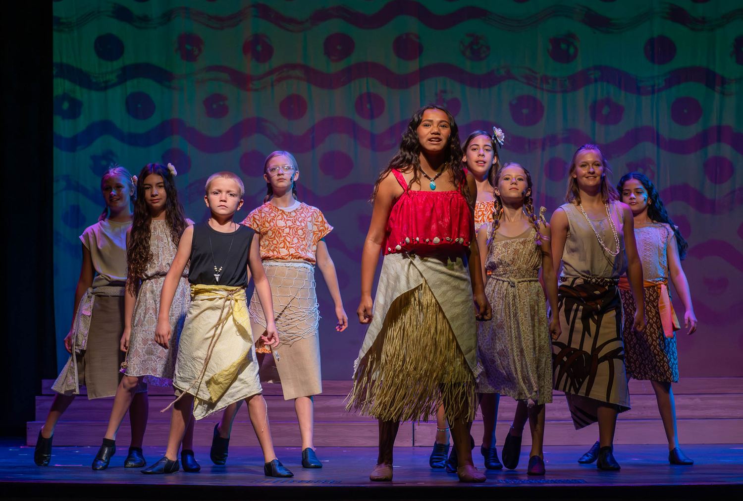 Young Encore performers on stage during a production at the Electric Theater