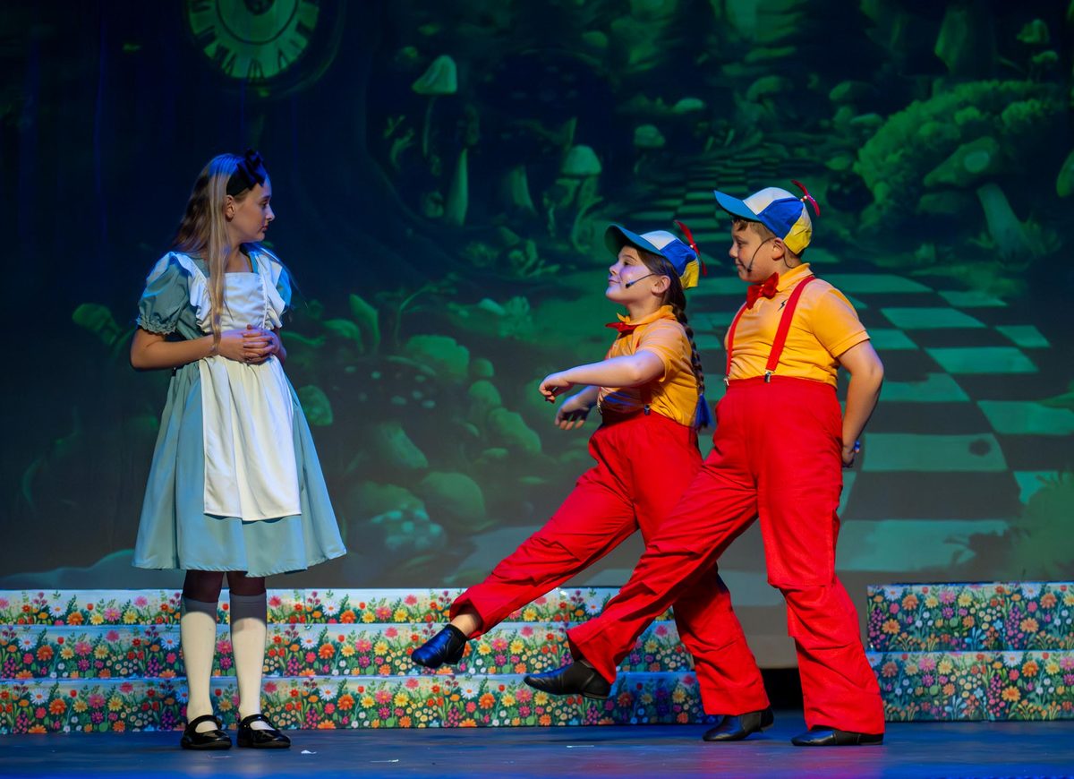 Young Artists performing a scene from Alice in Wonderland with the Tweedle twins